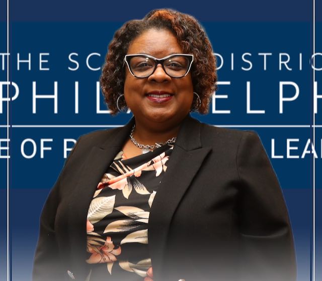 This is a photo of Principal Dancy that accompanies her welcome back letter to the school community.