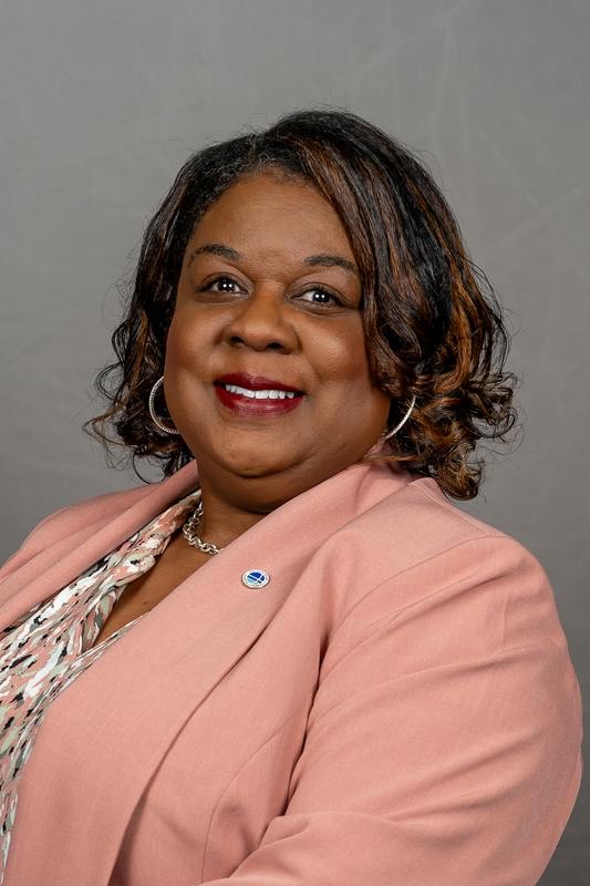 This is a photo of Principal Dancy that accompanies her welcome back letter to the school community.